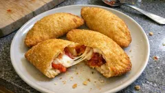 Panzerotti in friggitrice ad aria: dorati fuori e filanti dentro, pronti in pochi minuti